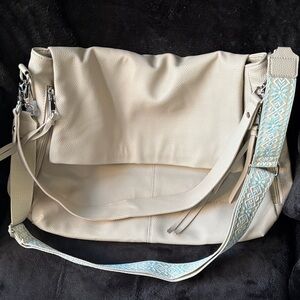 Cream colored hobo crossbody shoulder bag